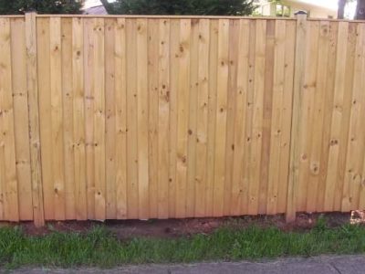 Board and Batten Fence with a Cap Board