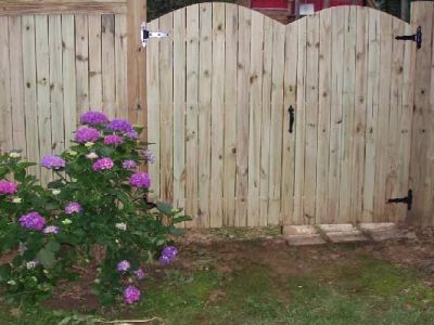 Solid Board Fence and Double Arched Gate